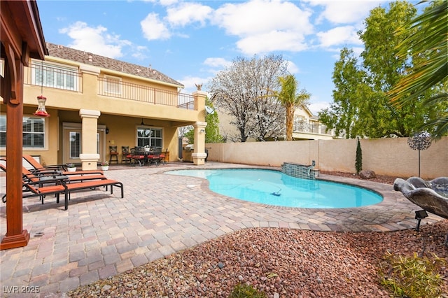 view of pool featuring a fenced in pool, a patio, and fence