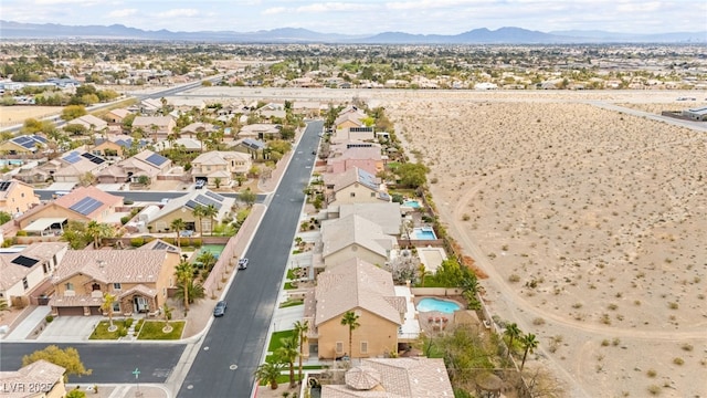 aerial view featuring a mountain view and a residential view