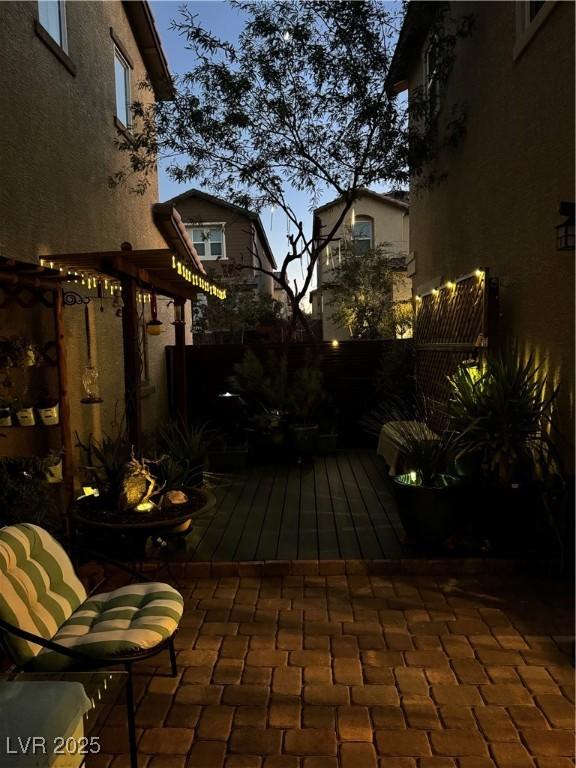 view of patio featuring fence