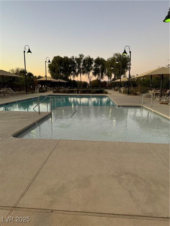 community pool with a patio