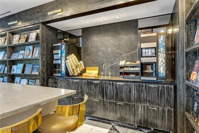 bar featuring tile patterned flooring