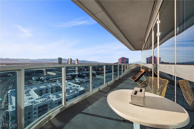 balcony featuring a mountain view