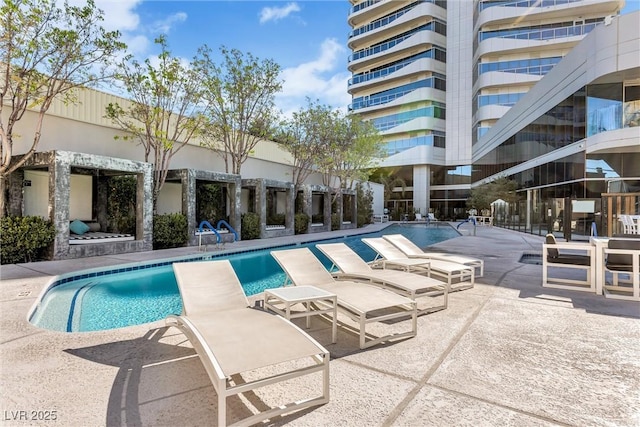 community pool featuring a patio