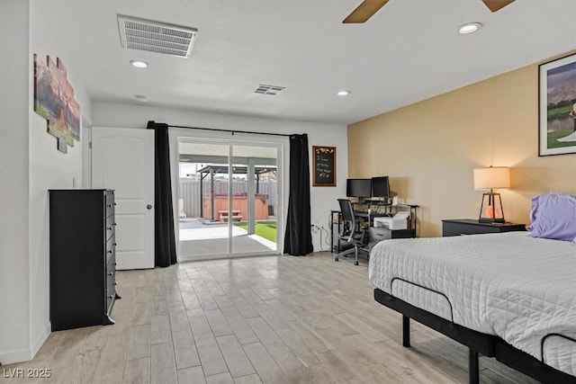 bedroom with recessed lighting, visible vents, light wood-style floors, and access to outside