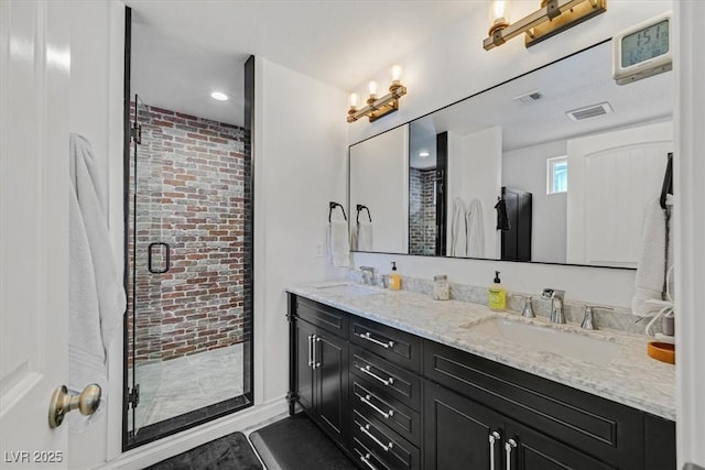 full bath featuring a sink, visible vents, and a stall shower