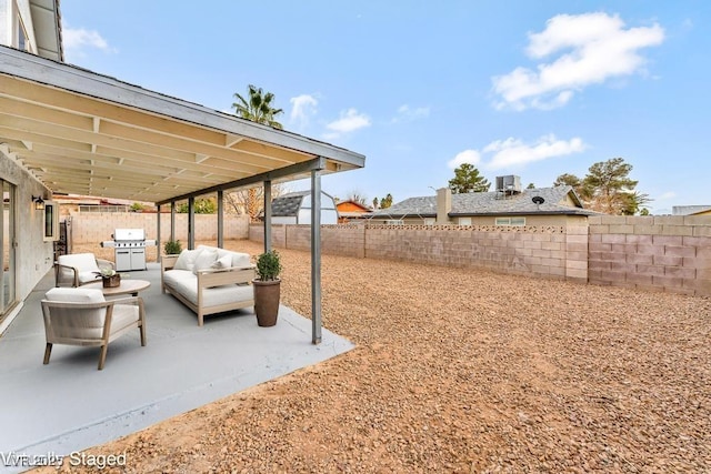 view of yard with a patio area, an outdoor hangout area, and a fenced backyard