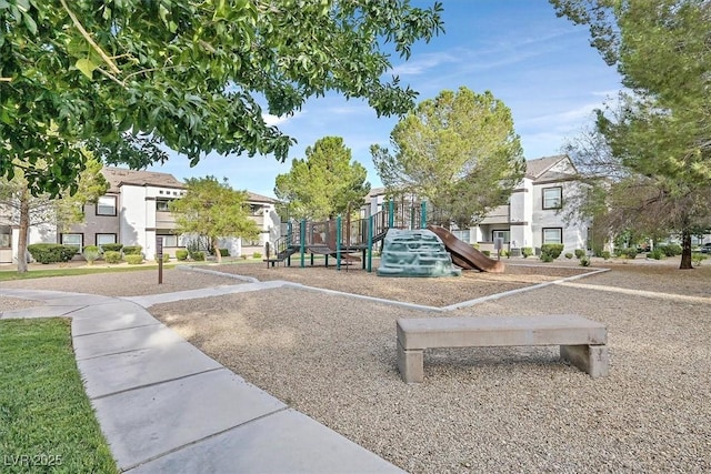 community jungle gym featuring a residential view