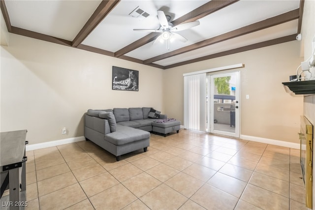 living room featuring visible vents, beamed ceiling, ceiling fan, and light tile patterned flooring