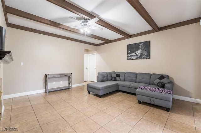 living room with beam ceiling, light tile patterned floors, baseboards, and ceiling fan