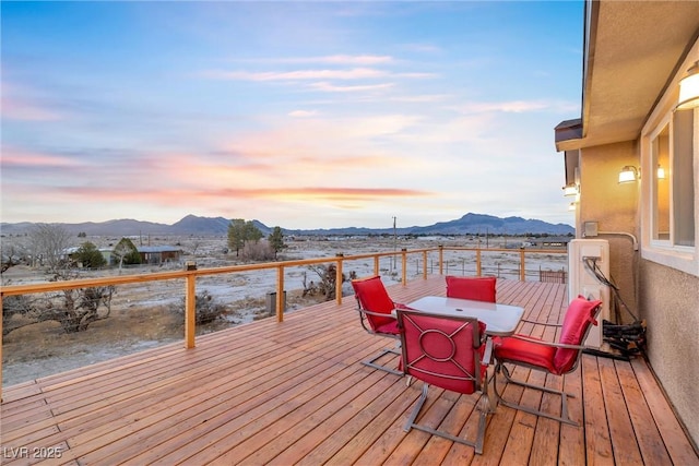 wooden terrace with a mountain view