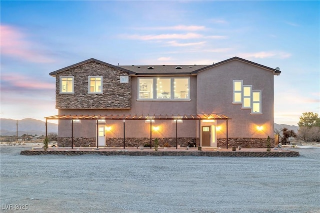 view of front of property featuring stucco siding