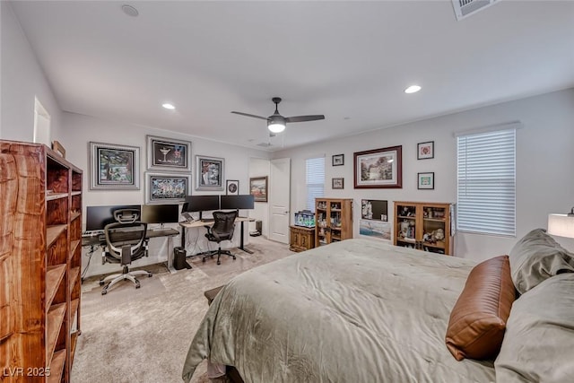 bedroom featuring light carpet, visible vents, recessed lighting, and a ceiling fan