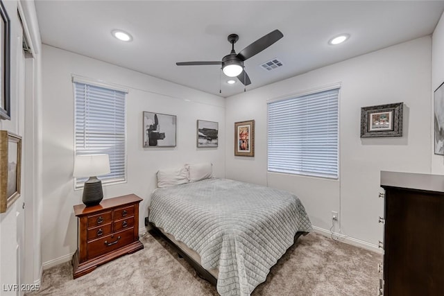 bedroom featuring recessed lighting, carpet flooring, baseboards, and visible vents