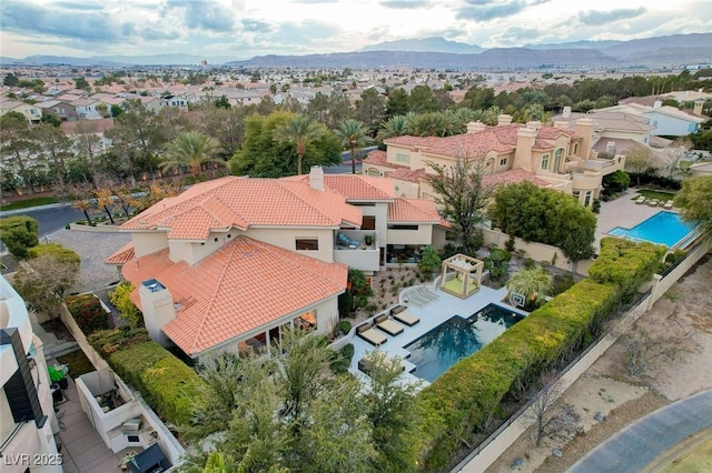 bird's eye view with a mountain view and a residential view