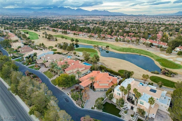 bird's eye view featuring a residential view, a water and mountain view, and view of golf course