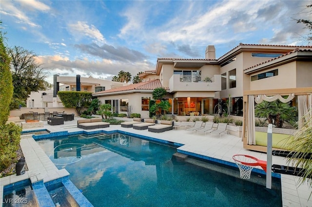 exterior space featuring an outdoor living space and a patio