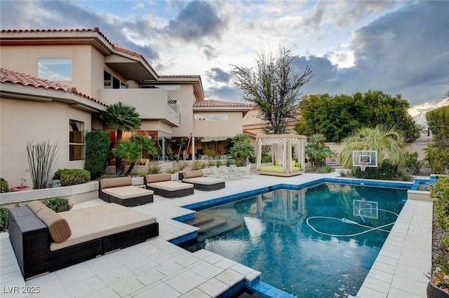 outdoor pool featuring a patio