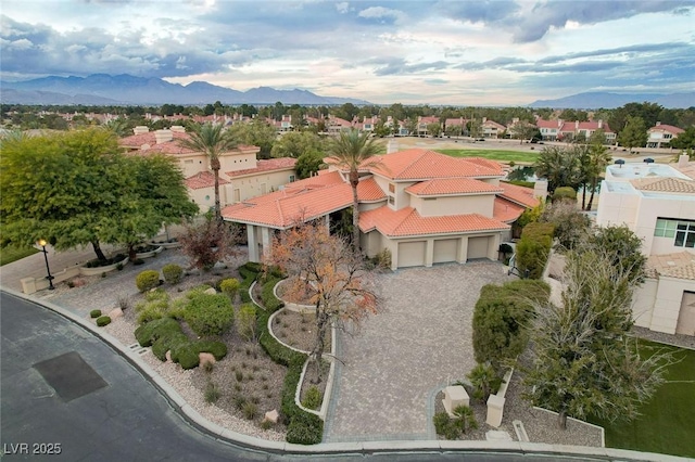 birds eye view of property with a residential view and a mountain view