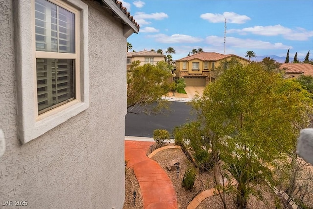872 Timber Walk Dr, Henderson, NV 89052 - exterior space with a tiled roof and stucco siding