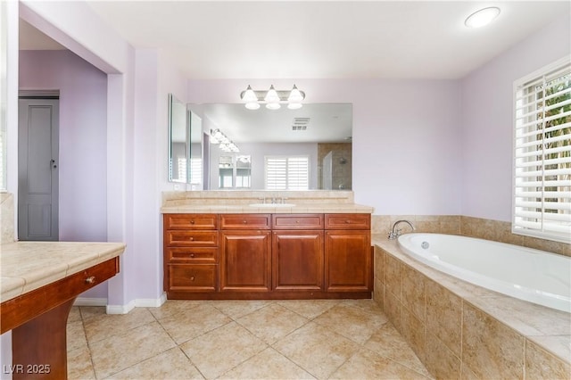 872 Timber Walk Dr, Henderson, NV 89052 - full bathroom featuring a bath, tile patterned flooring, tiled shower, and vanity