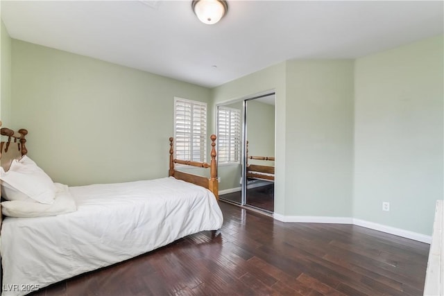 872 Timber Walk Dr, Henderson, NV 89052 - bedroom with wood finished floors, a closet, and baseboards