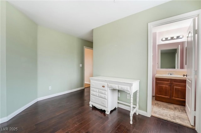 872 Timber Walk Dr, Henderson, NV 89052 - unfurnished office featuring dark wood-style floors, baseboards, and a sink