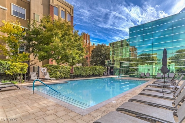 pool with a patio area