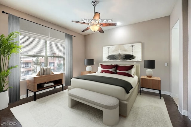 56 E Serene Ave Unit 306, Las Vegas, NV 89123 - bedroom featuring baseboards and ceiling fan