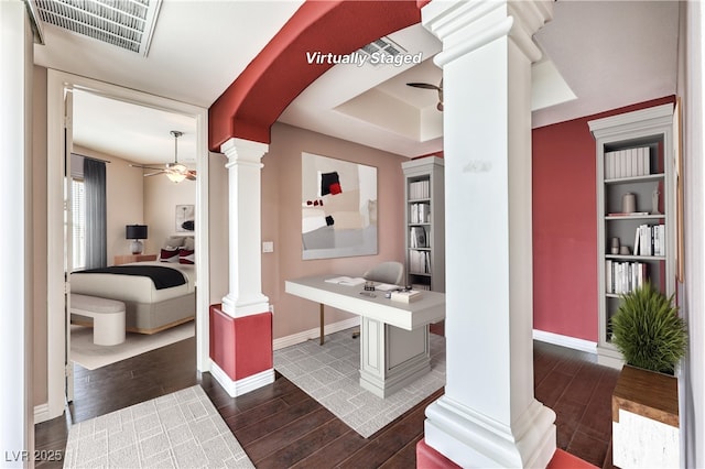 56 E Serene Ave Unit 306, Las Vegas, NV 89123 - office space with decorative columns, ceiling fan, wood finished floors, and baseboards