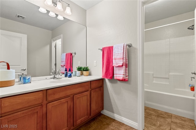 full bathroom with tile patterned flooring, visible vents, baseboards, shower / tub combination, and vanity