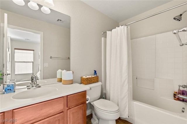 full bathroom featuring vanity, shower / bathtub combination with curtain, visible vents, tile patterned floors, and toilet