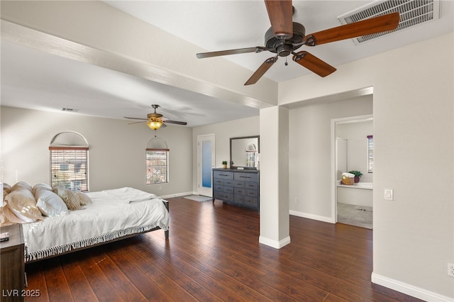 bedroom featuring visible vents and hardwood / wood-style flooring