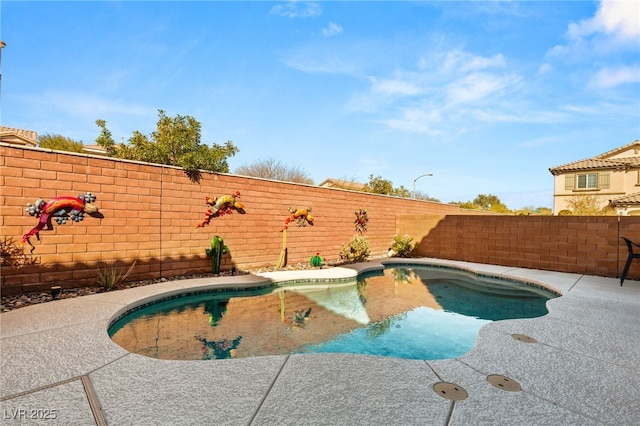 view of swimming pool featuring a fenced in pool and a fenced backyard