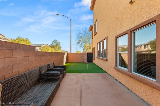 view of patio with a fenced backyard