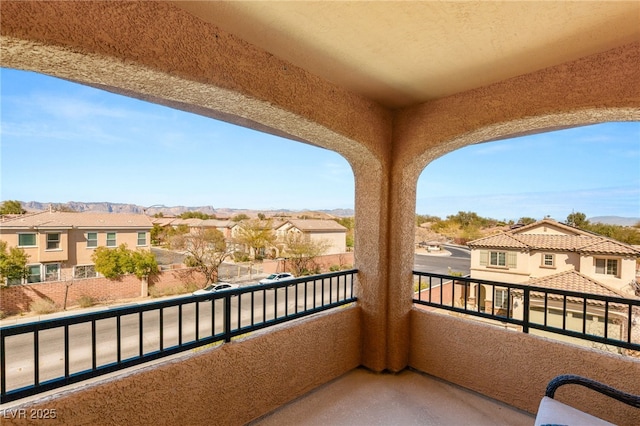 balcony featuring a residential view