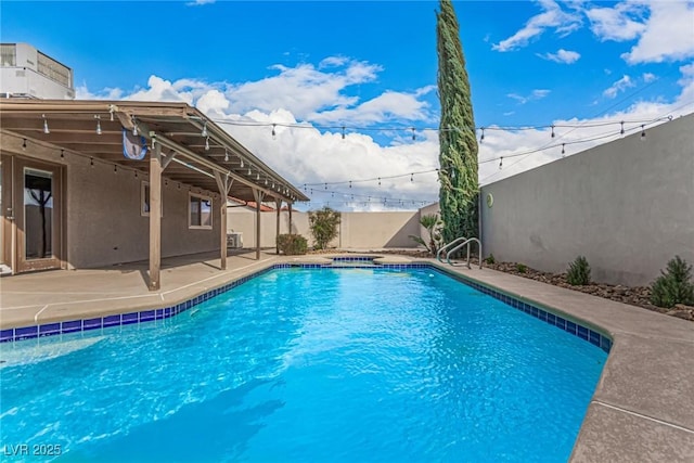 view of swimming pool featuring a fenced in pool, a patio, and a fenced backyard