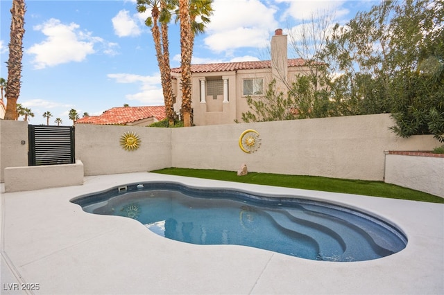 view of pool featuring a fenced backyard