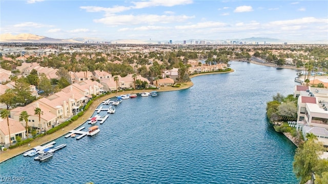 aerial view with a residential view and a water view