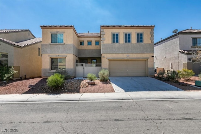 view of front of property with stucco siding, fence, concrete driveway, an attached garage, and a tiled roof