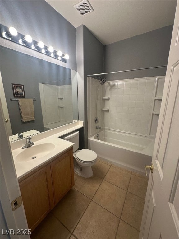 bathroom featuring visible vents, toilet, tile patterned flooring, bathtub / shower combination, and vanity