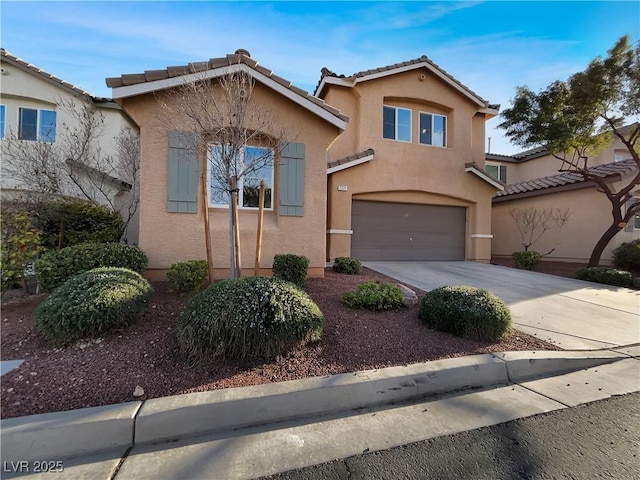 view of front of property with a tiled roof, an attached garage, driveway, and stucco siding