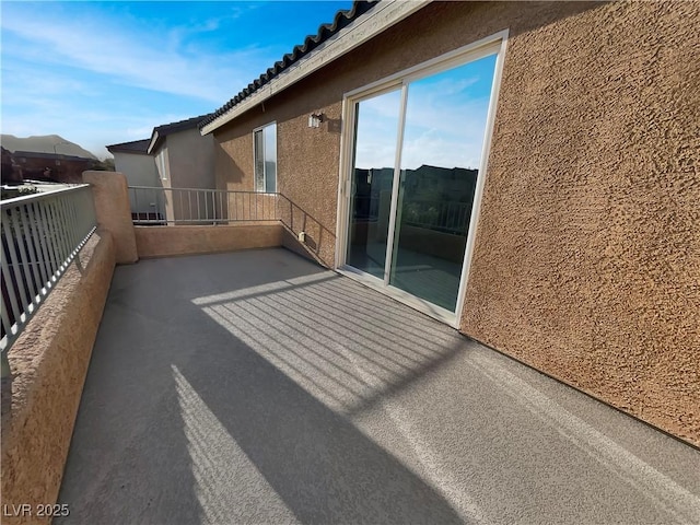 view of patio / terrace featuring a balcony