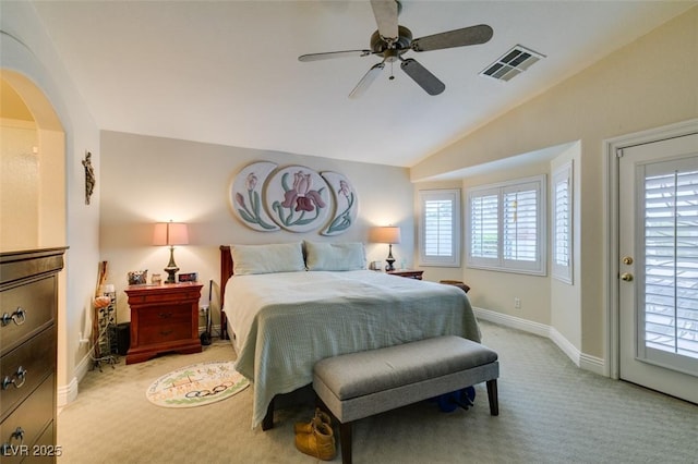 bedroom featuring baseboards, visible vents, access to exterior, vaulted ceiling, and light carpet