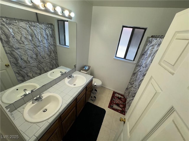 bathroom featuring a sink and toilet