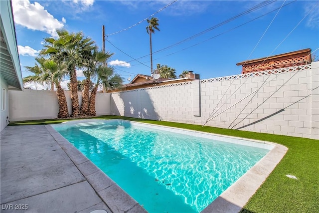 view of swimming pool featuring a fenced in pool, a patio, and a fenced backyard