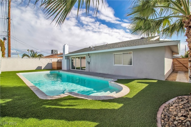 view of pool featuring a yard, a fenced backyard, and a fenced in pool