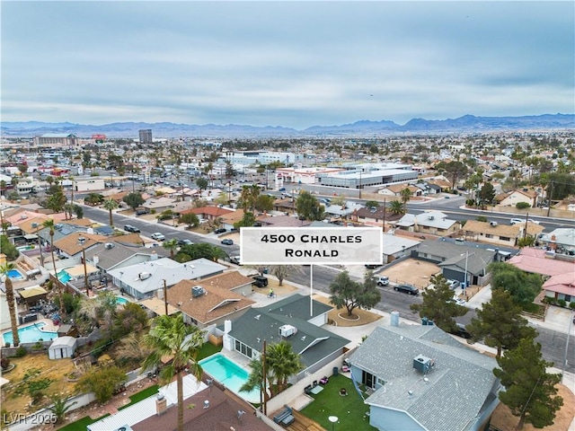 aerial view with a residential view and a mountain view