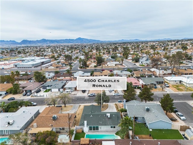 aerial view with a residential view and a mountain view