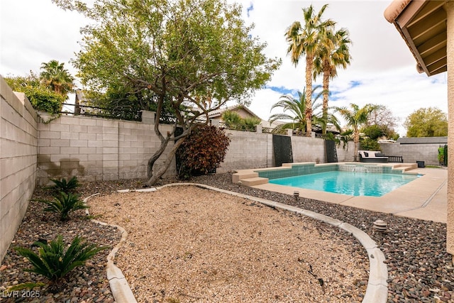 view of swimming pool with a patio area, a fenced in pool, and a fenced backyard