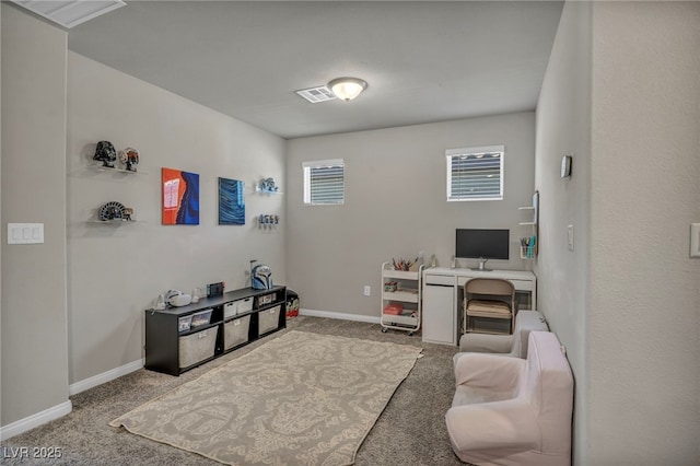 carpeted home office featuring baseboards and visible vents